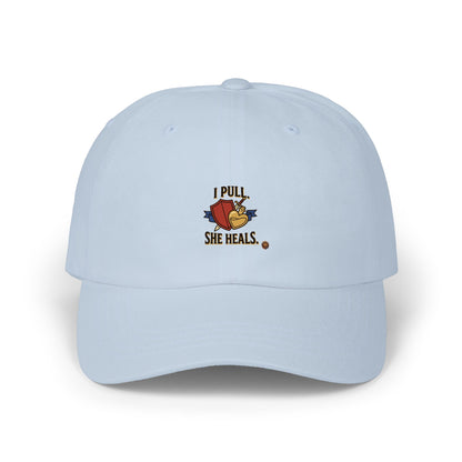 I Pull. She Heals. – Cap